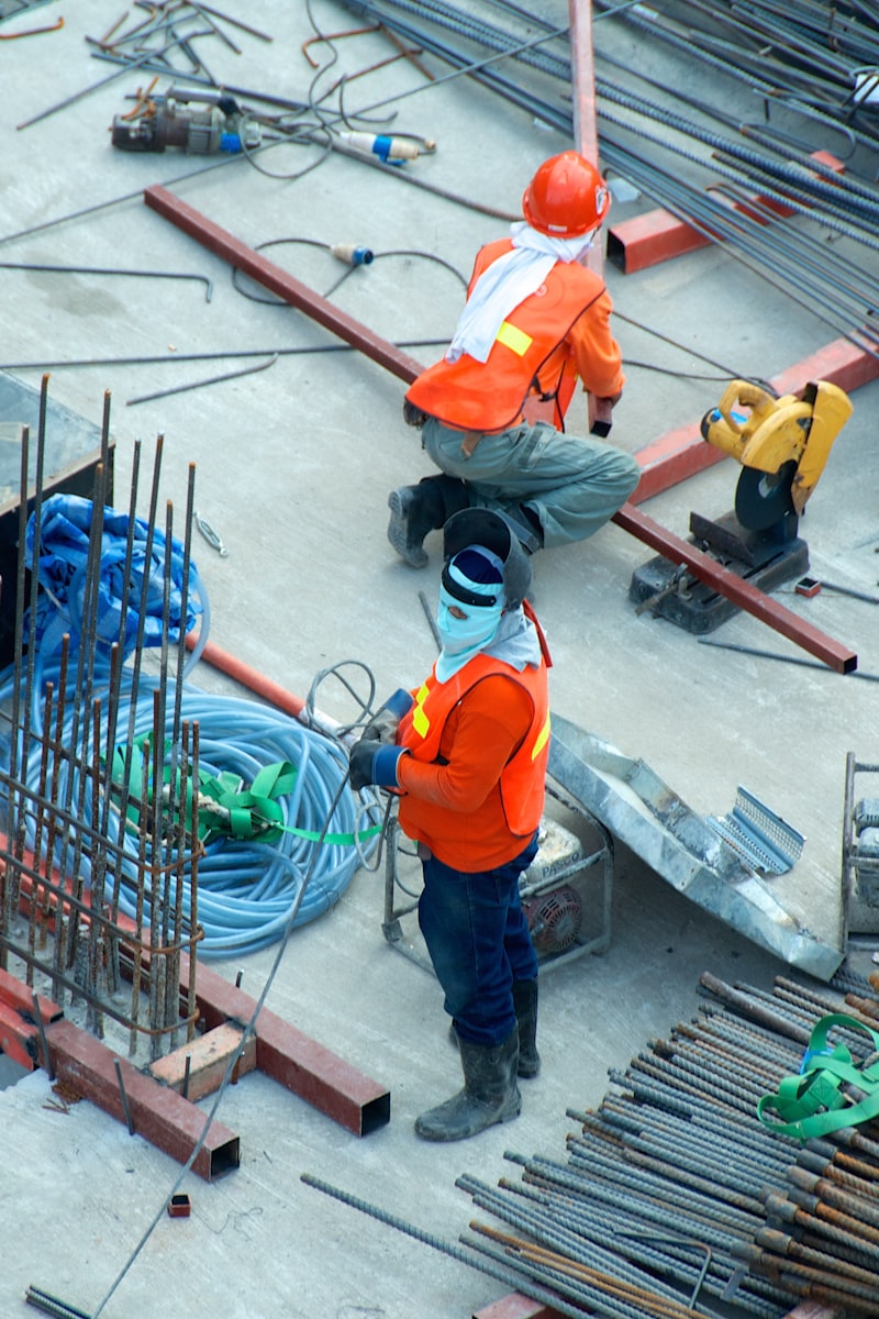 Construction site photo with GPS timestamp and address stamp overlay